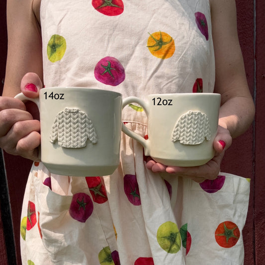 white sweater mug